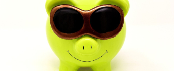 piggy bank with sunglasses - representing azure cost optimisation