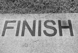 Finish line on pavement black and white
